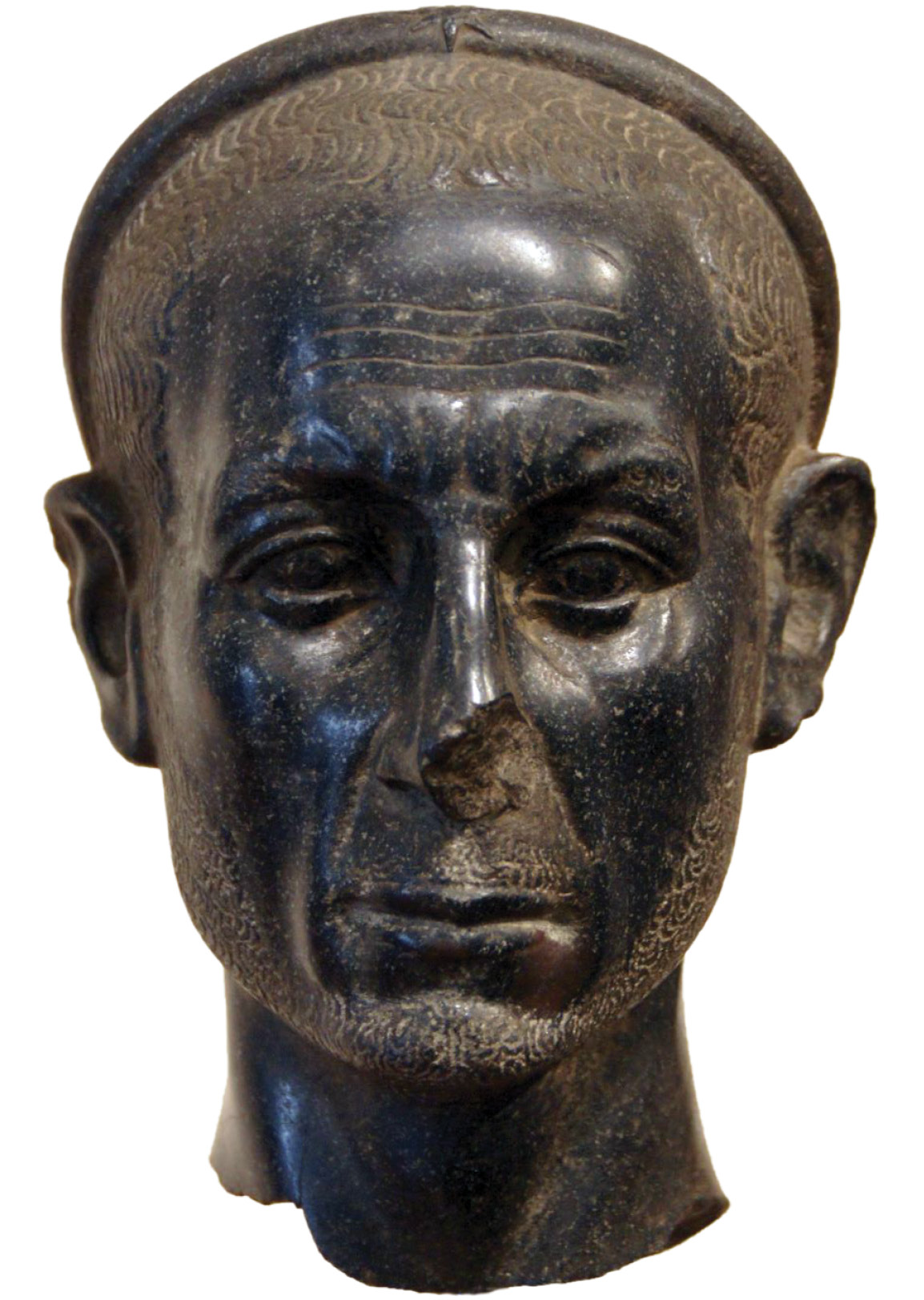 below left Egyptian black diorite head of a bearded man, believed by Barracco to be Julius Caesar, but more likely a priest. Ptolemaic era, second half of the 2nd century BC. below right Black diorite head of Pharaoh Seti I wearing the ‘blue crown’. 19th Dynasty,1279-1212 BC.