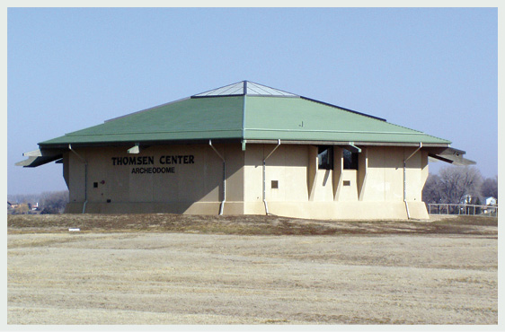 left Inside and outside the Archeodome, which provides shelter over part of the site. This allows year-round excavation to take place; visitors can observe from the gantry.