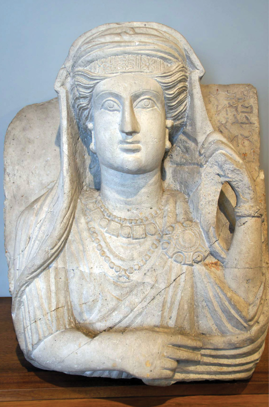 above left High relief portrait of a woman from a tomb in Palmyra (Syria). Limestone, beginning of the 3rd century AD. Above right Mosaic of the Ecclesia Romana from the apse of St Peter’s in Rome, formerly in the Barberini collection. End of the 12th/beginning of the 13th century AD.