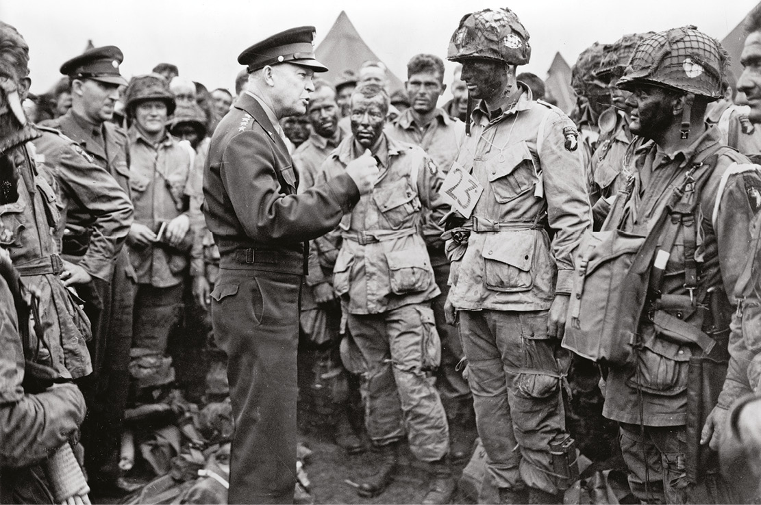 LEFT General Dwight D Eisenhower addresses American paratroopers prior to D-Day, 1944. On the Western Front, he preferred a broad advance to steadily destroy the German military machine as opposed to a race with the Soviets to Berlin.