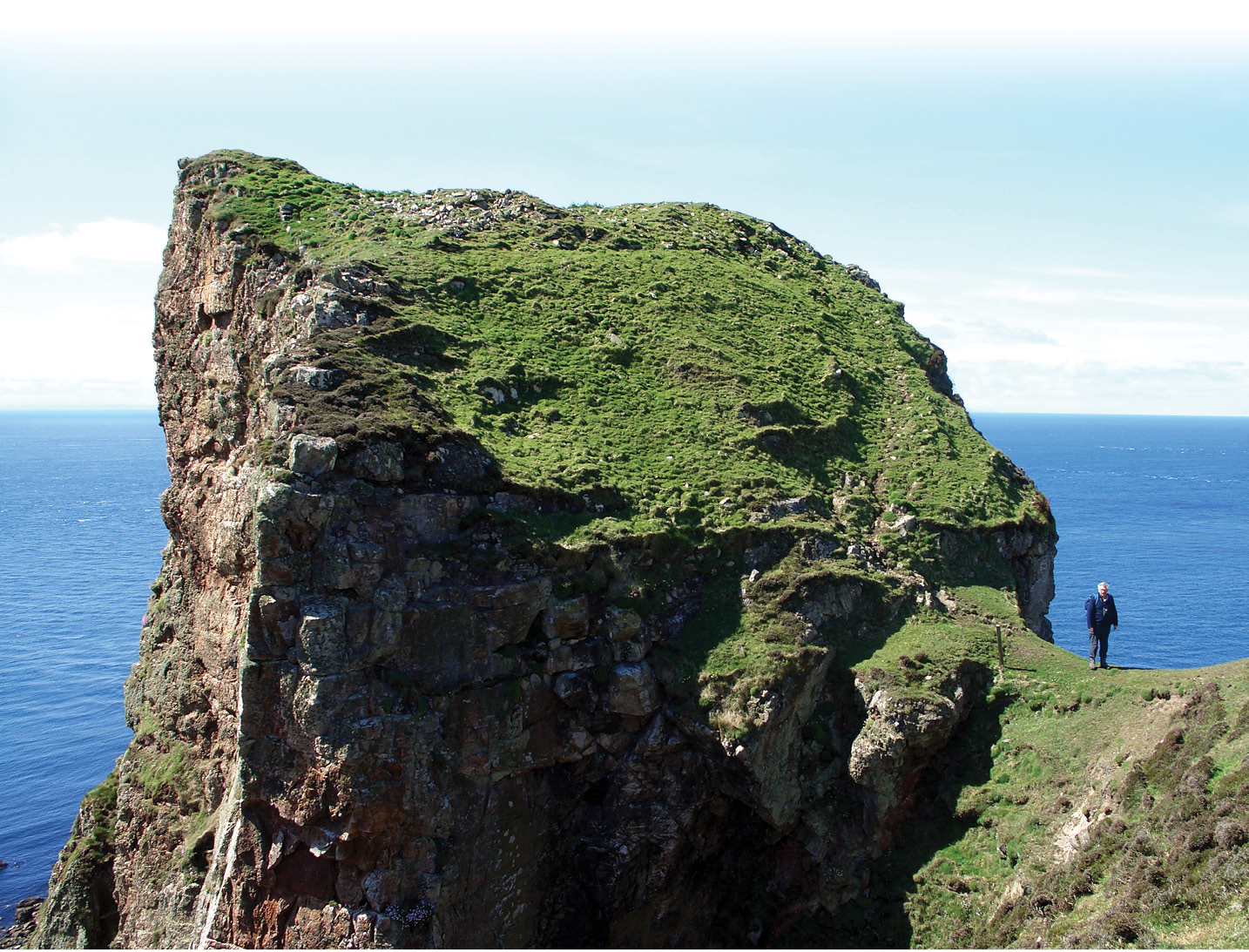 below Dun Athad on Islay has a promontory fort precariously perched on a narrow finger of rock linked to the mainland by a natural causeway.
