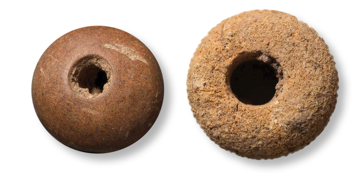 above Far-flung finds: the rightmost of these two beads is amber, and was brought to the Ness from far beyond Orkney’s shores. Fragments of axes (left) from the Lake District have also been excavated on the site.
