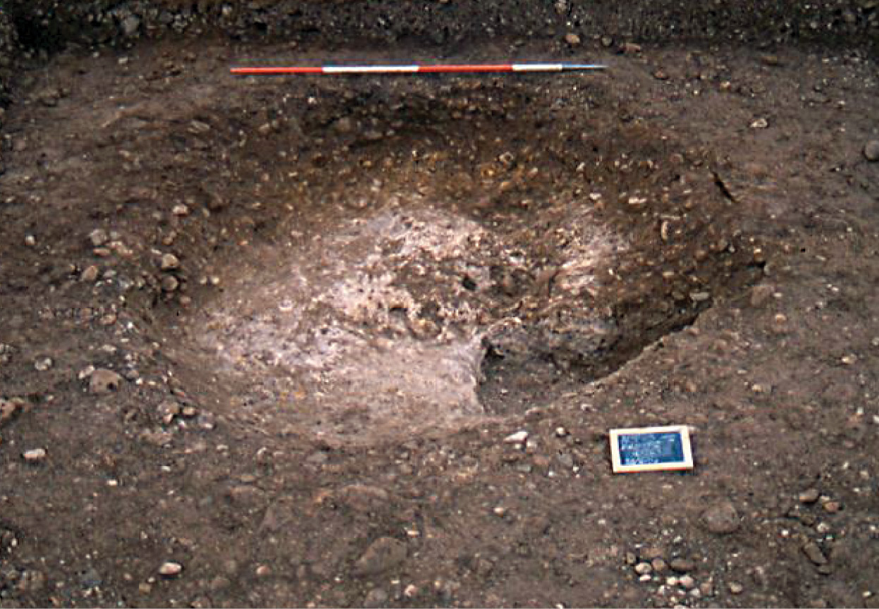 above This partially excavated pit contains burnt gypsum, perhaps connected to the preparation of the material for use in whitening the banks of the henges, lending them a symbolic relationship to bone, moonlight, and the stars.