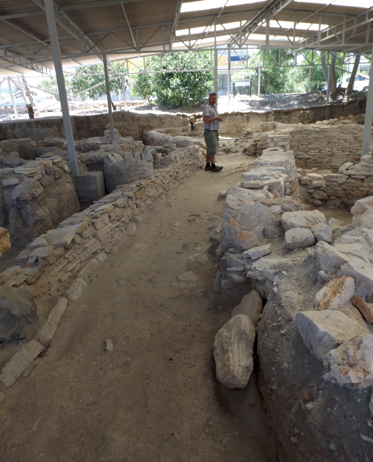 right Activity at Çeşme seems to have shifted along the coastline over time. Here we see Vasıf Şahoğlu standing in a Bronze Age street, within a part of the site that was not affected by the tsunamis.