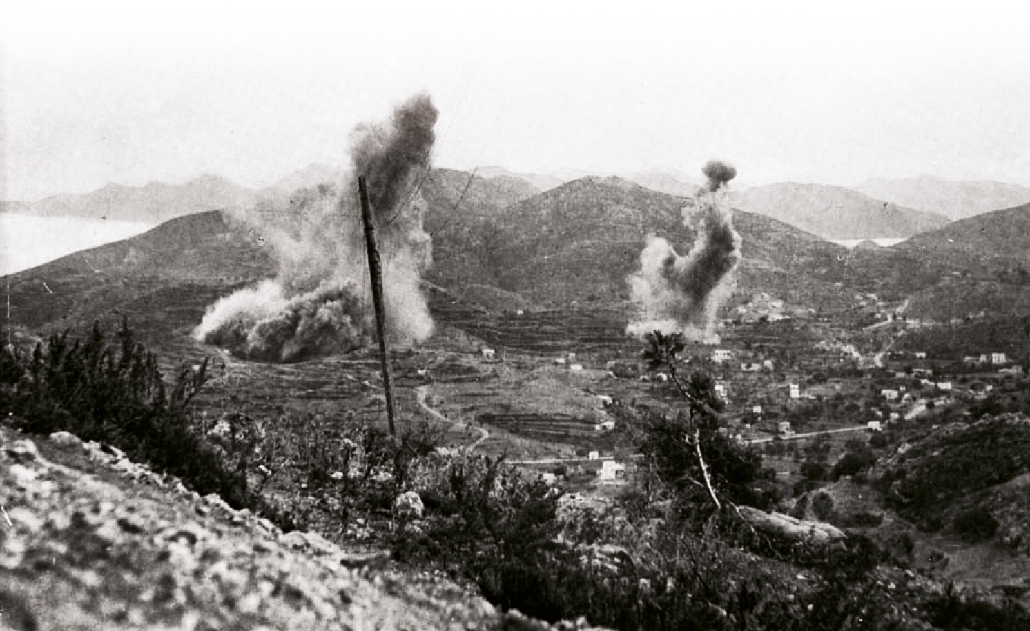 ABOVE German bombs explode on Leros during the November attack.