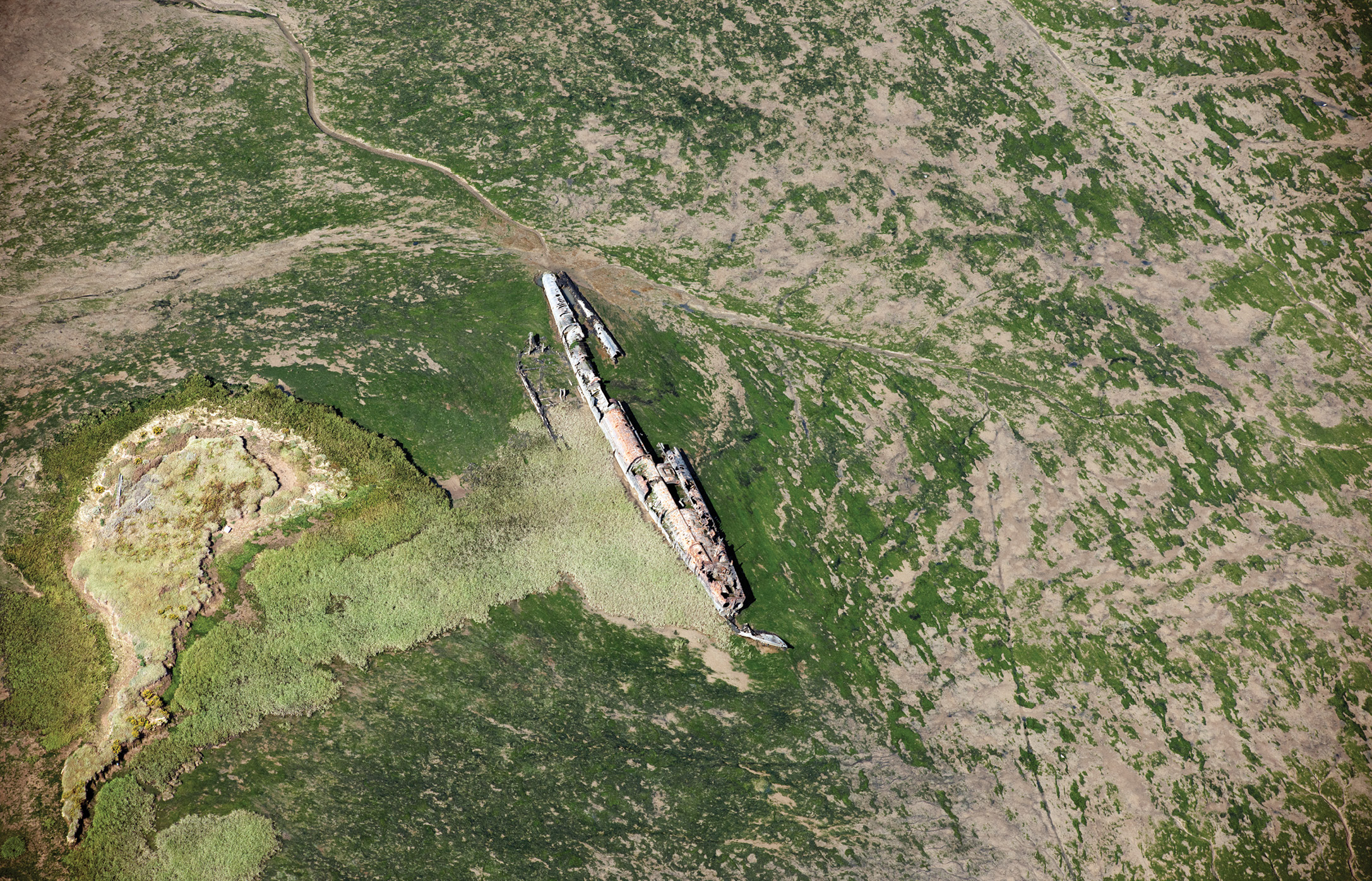 above One of the more modern wrecks covered by English Heritage’s survey: the remains of a U-boat surrendered after the First World War, which now lies in Stoke Saltings on the north coast of Kent. Her identity remains unknown, but it has been suggested she could be UB-122, which was lost while being towed for breaking in 1921.