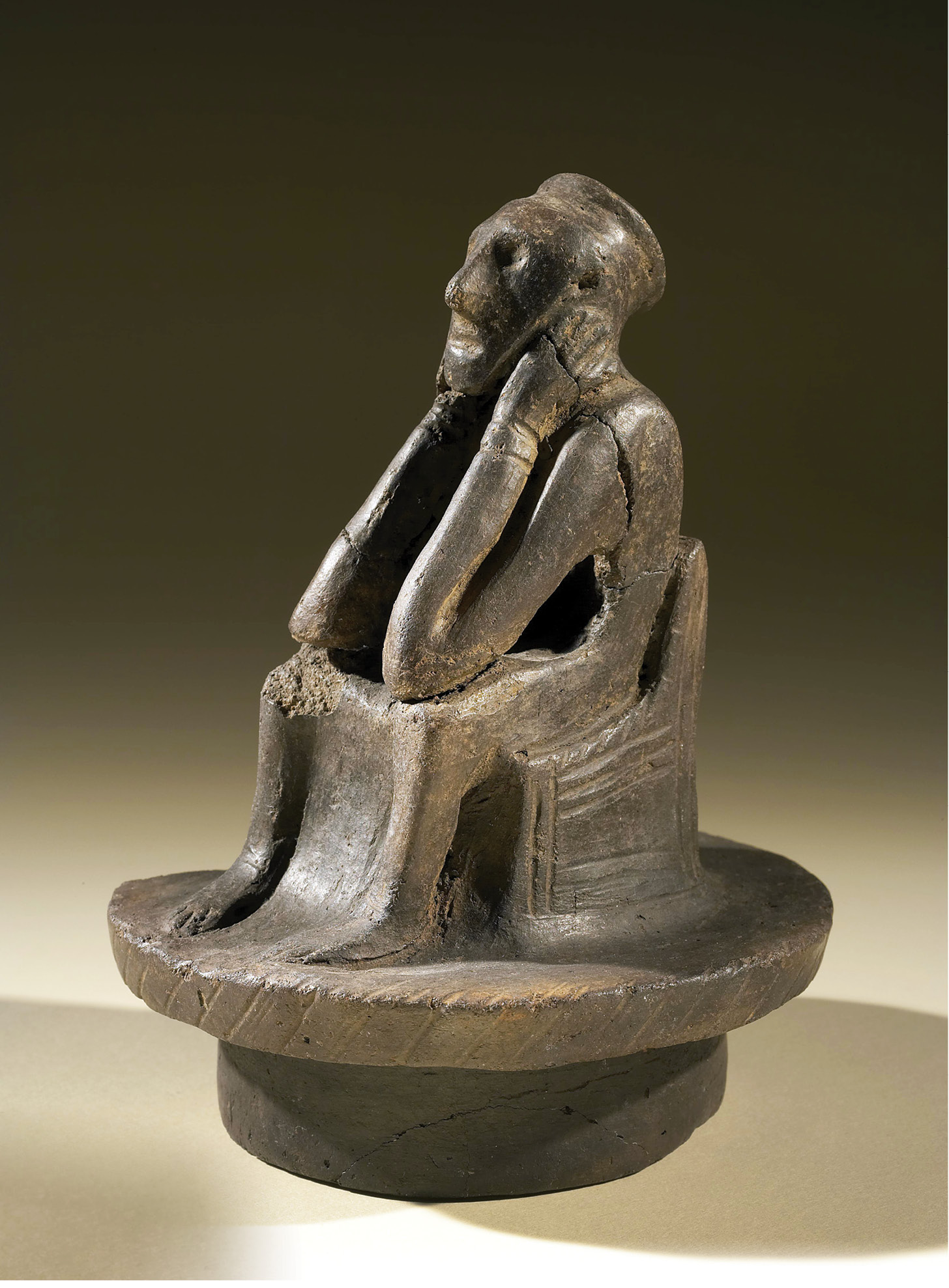 left Top of the pots: dating to the early/mid-5th century, the rather charismatic figurine known as ‘Spong Man’ decorates the lid of an Anglo-Saxon cremation urn from Spong Hill in Norfolk.