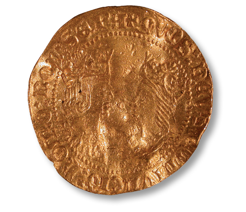 below This gold castellano of Ferdinand and Isabella of Castile in Spain dates to the late 15th century, and is one of several Medieval Spanish coins recovered from Praa Sands in Cornwall.