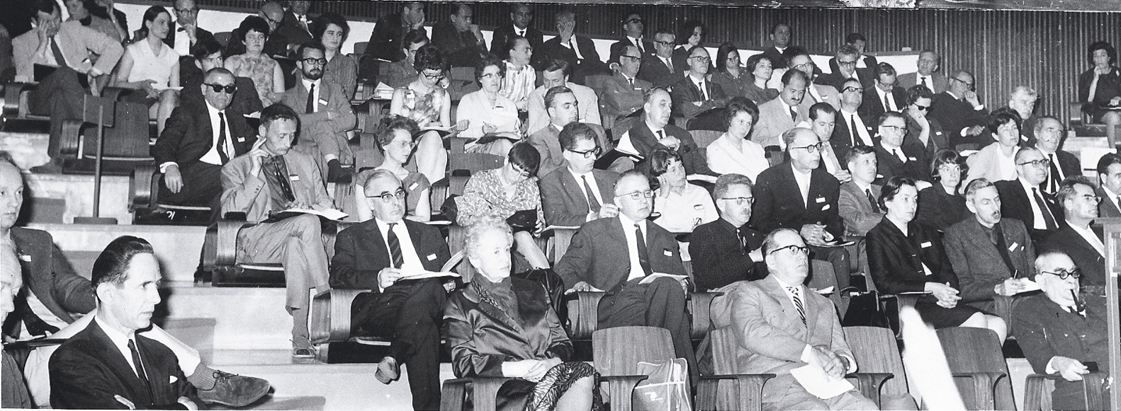 LEFT The Congress attends a lecture in Israel in 1967 (note the smoking in the auditorium). Among those present were: left of the aisle, second row, Barri Jones; right of the aisle, second row, second Hans Schönberger, third John Gillam; third row, first Michael Jarrett, second Dorothy Charlesworth, seventh Dietwulf Baatz.