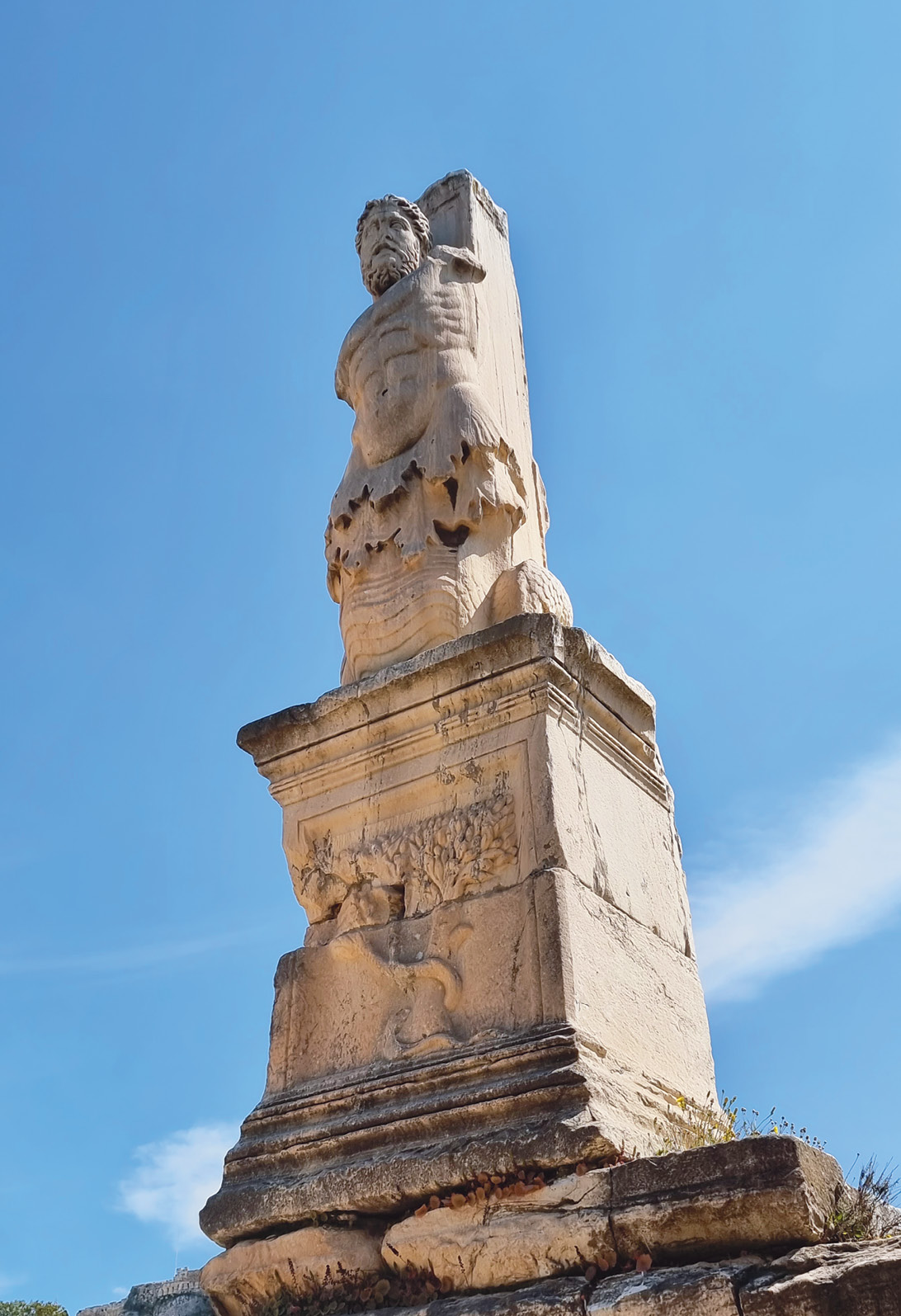 right One of the monumental figures of giants and tritons that once adorned the Odeon of Agrippa.