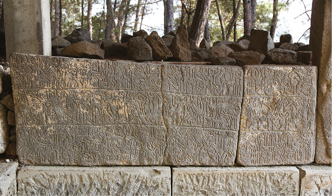 BELOW The Luwian hieroglyphics on the bilingual inscription at Karatepe that helped decode this ancient language.