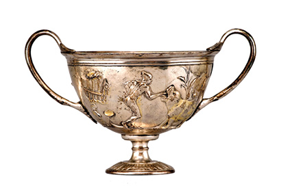 above Skyphos (drinking cup) with a Nilotic scene, Parcel silver gilt, 1st-2nd century AD. Size: 10.4 x 17cm below Lawrence Alma-Tadema, Pastime in Ancient Egypt. Oil on canvas, 1864. Size: 113 x 150cm