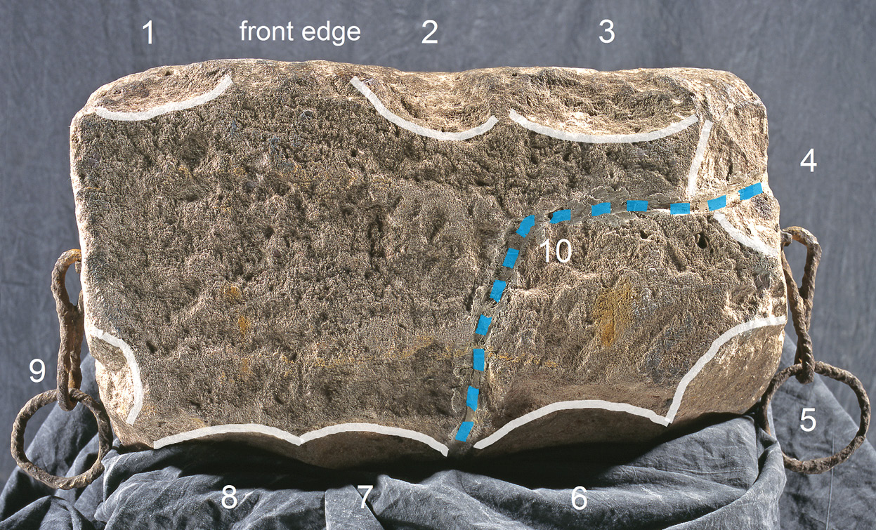 BELOW The underside of the Stone, showing where nine hammer blows broke away the lower edges. The blue line indicates the fracture sustained during the theft of the Stone in 1950. It was already cracked.