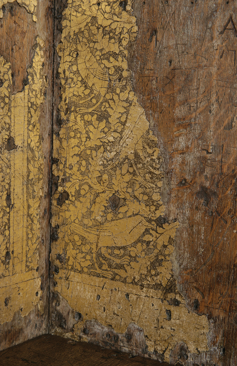RIGHT A detail of the punch-decorated gilding surviving inside the Chair’s left arm, showing birds amid vegetation.