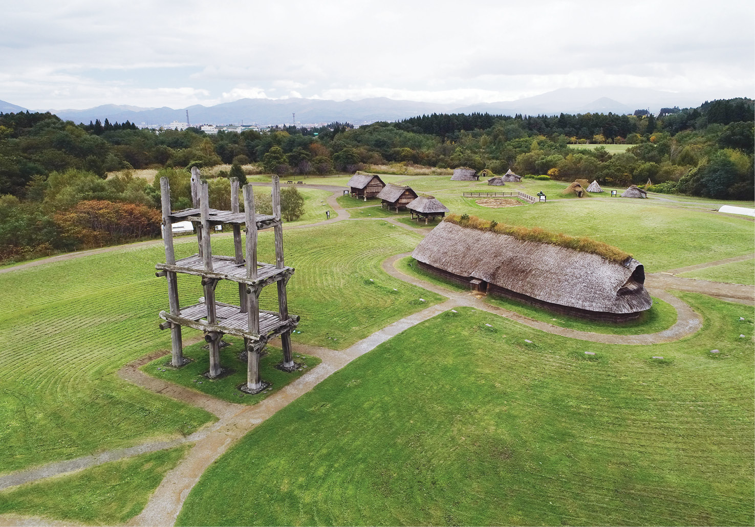 RIGHT A major Jomon settlement developed at Sannai Maruyama. It was occupied from roughly 5,900-4,200 years ago, and today is home to several reconstructions, including the longhouse, towering pillared structure, and storehouses visible here. below right Pit dwellings, believed to be family houses, were discovered in large numbers at Goshono. Some of these residences had burned down, providing important traces of their fabric. Reconstructions at the site provide an impression of the original appearance of these structures.
