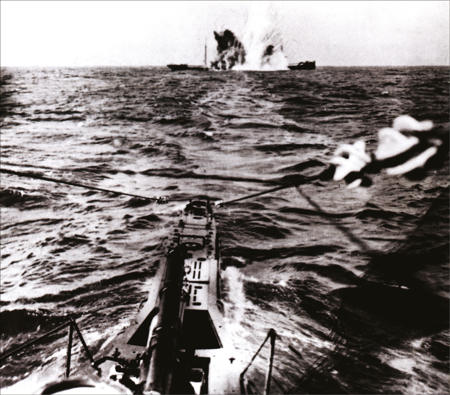 LEFT A German U-boat torpedoes a British merchantman. below Making wire anti-submarine nets to protect harbours during the First World War.