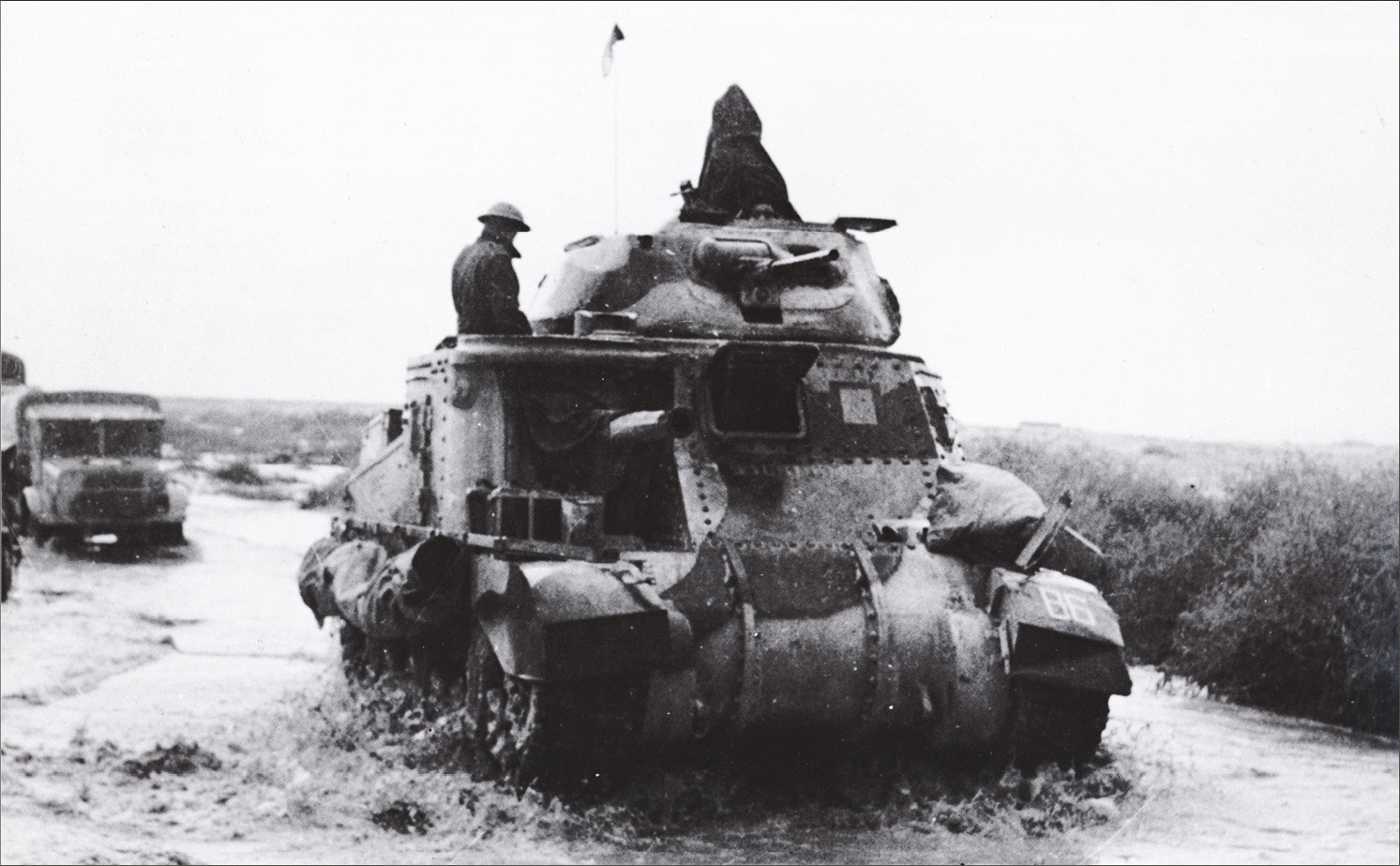 left A British tank in action. Montgomery’s slow pursuit of the retreating Germans was criticised. He was unprepared for a pursuit but he was also hampered by heavy rain.