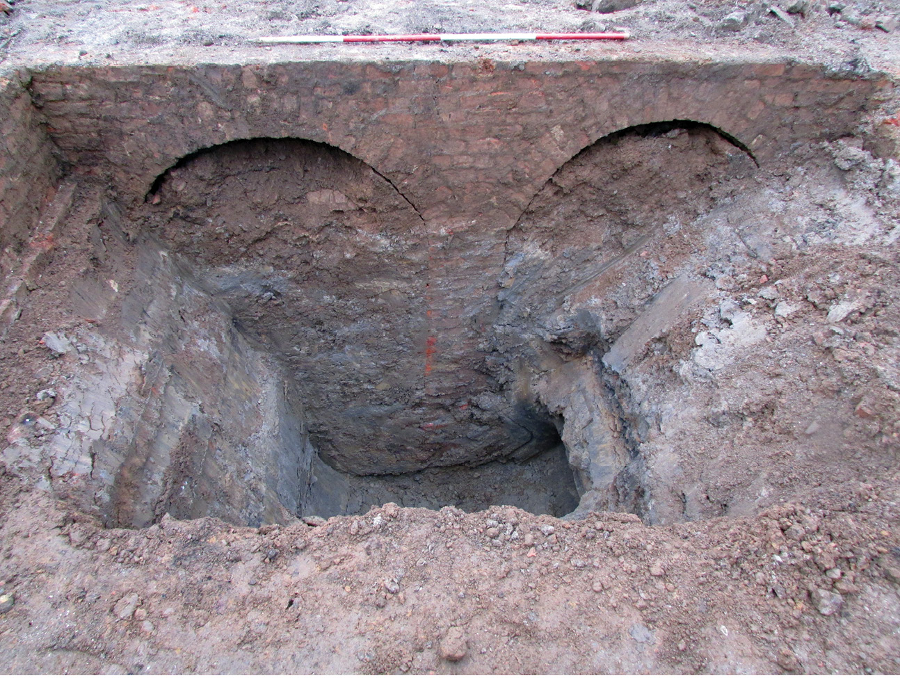 below Were these well-constructed arches within the felon workshops intended to relieve structural or social stress? With no obvious function, it has been suggested that they were deliberately over-engineered to create jobs.
