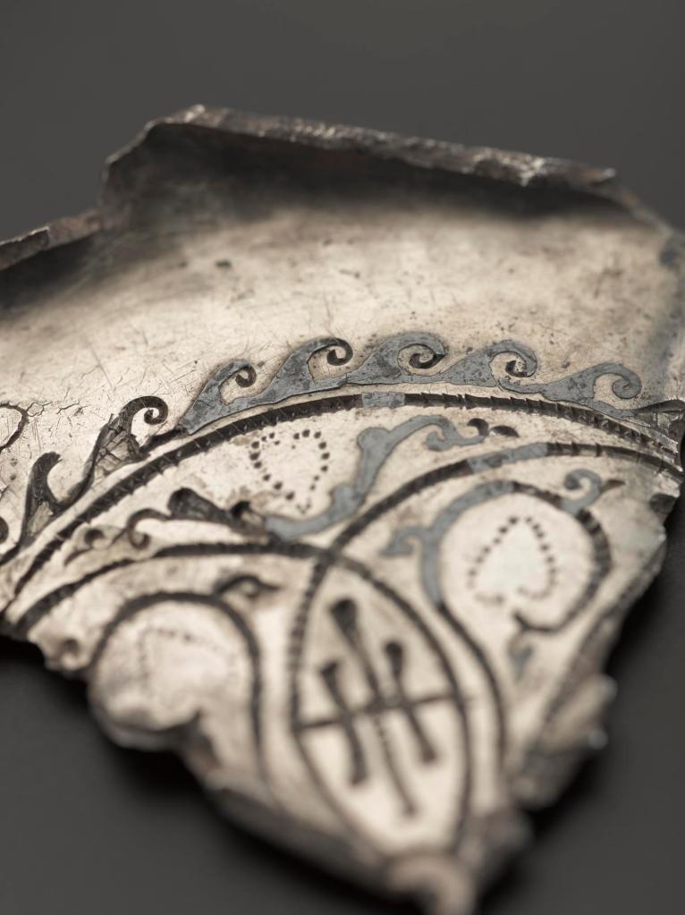 A detail of the cut-up niello decoration from the centre of the large dish.
