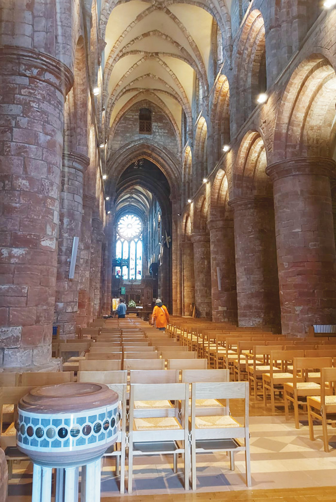right Looking down the nave of St Magnus Cathedral. Its columns have proved a rich repository of historic graffiti.