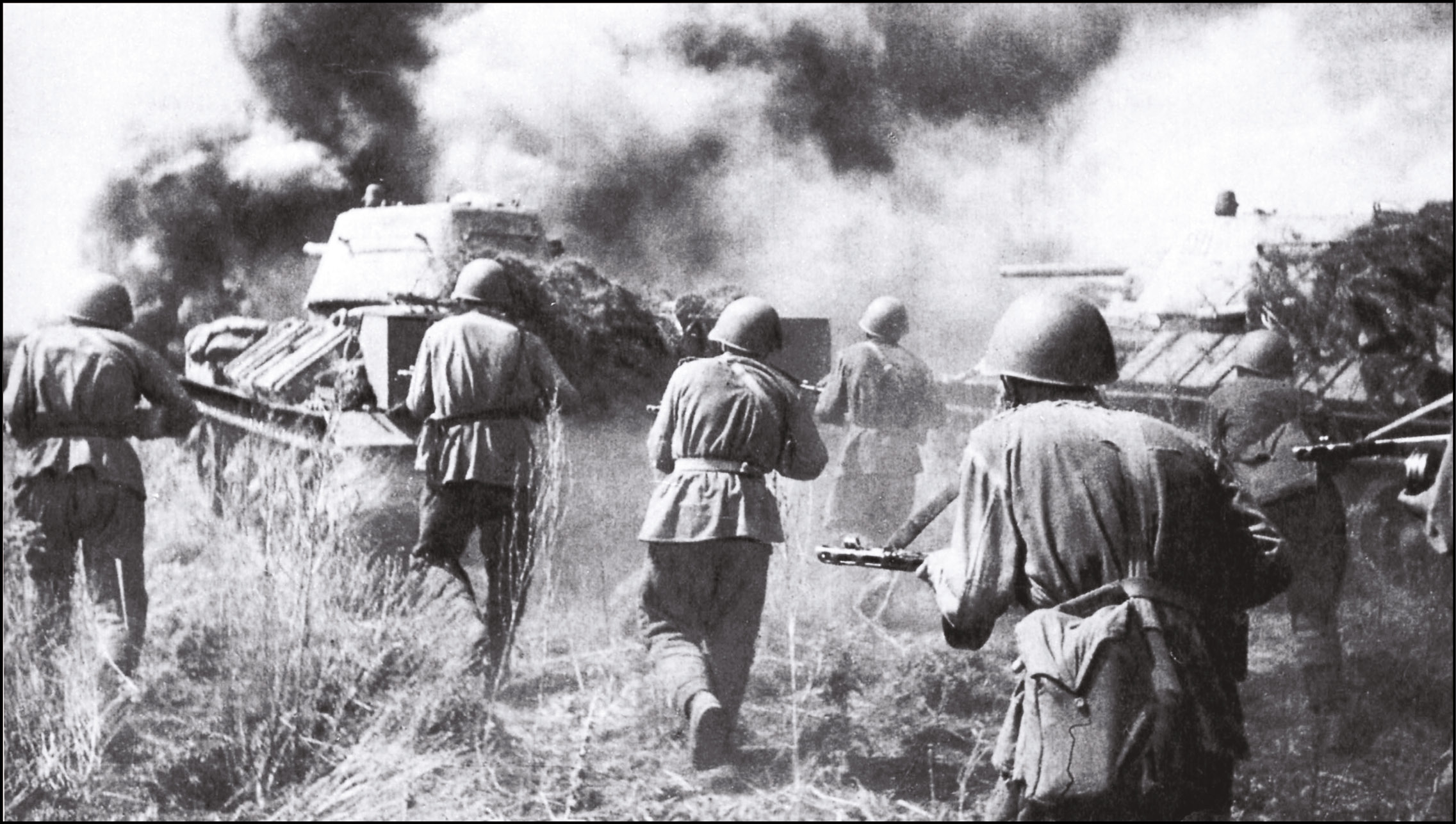 BELOW Soviet troops of the Voronezh Front counter-attacking behind T-34 tanks at Prokhorovka during the Battle of Kursk.