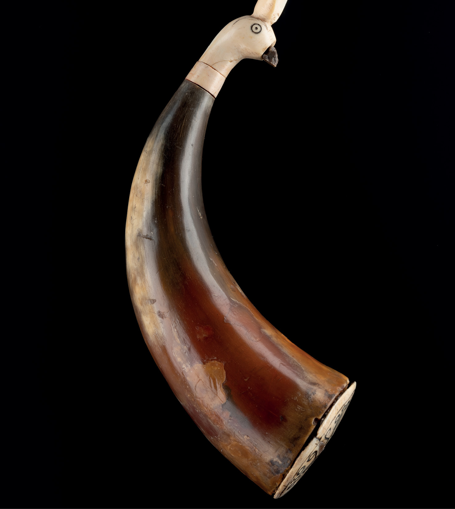 ABOVE & RIGHT Two views of a cow-horn oil-container with bird-headed ivory spoon. LEFT A stone bowl decorated with images of baboons.