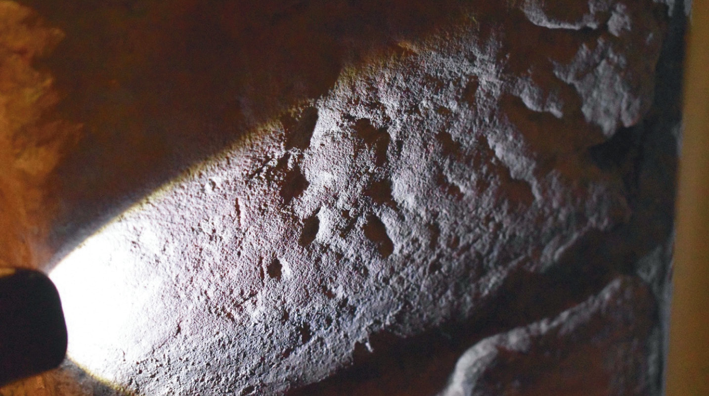 below Patterns of pecked dots might represent medieval pilgrims harvesting holy dust from the cathedral stonework, which they would take home and mix into medicinal drinks.