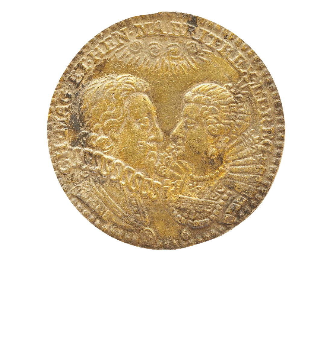 ABOVE A silver gilt medal commemorating the 1625 marriage of Charles I and the French princess Henrietta Maria, found in 2010 in a Shropshire field by a metal detectorist.