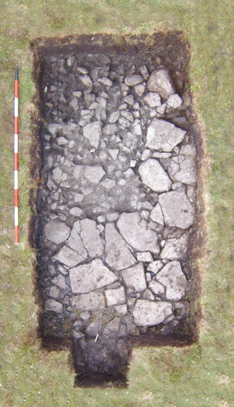 Left Trench B (facing north); fragments of pottery were found in the top left corner, the single pottery sherd was found in the centre of the lower end.