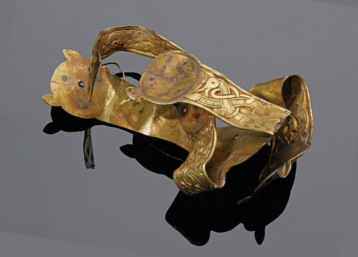 above Some of the most famous items in the Staffordshire Hoard, including the pectoral cross, seax fittings, and folded cross, were found to have been treated.