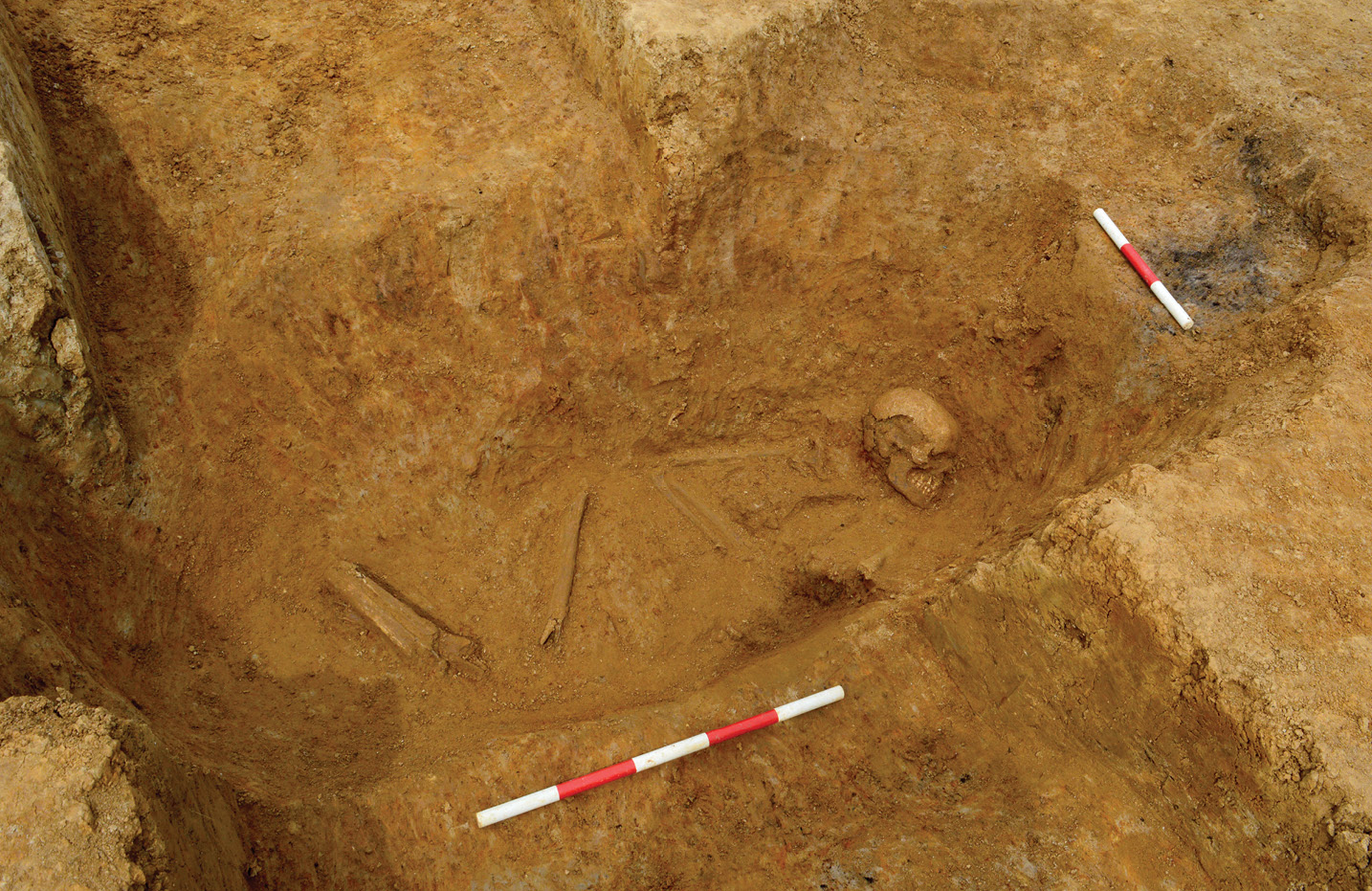 left A deeply dug grave was found cutting into the edge of the Roman road. It contained the remains of a woman aged 35-45, who most likely died in the later 1st century.
