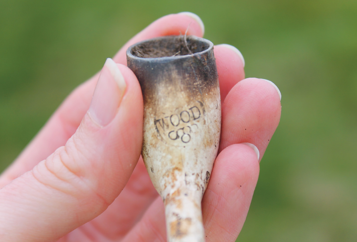 left The bowls of numerous clay tobacco pipes were recovered during the works. Many, like this example, bore clear manufacturers’ marks.