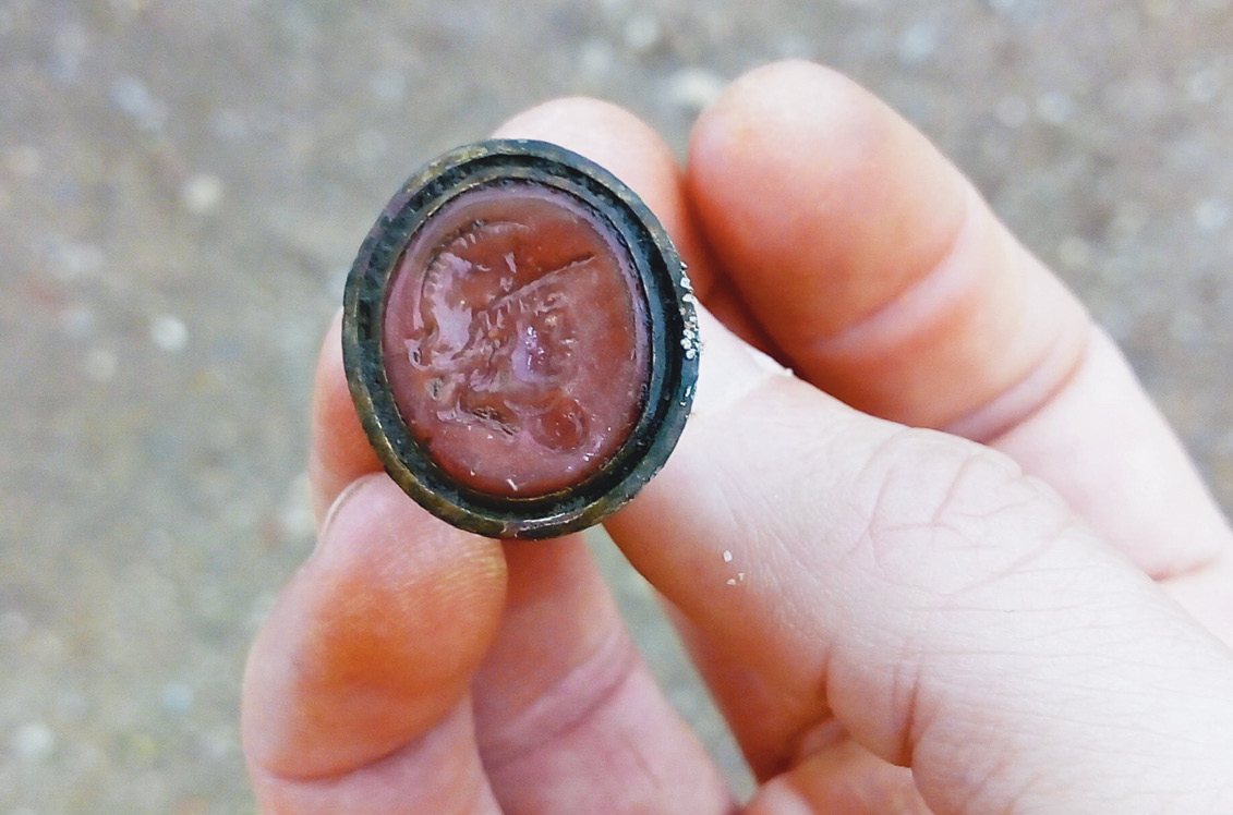 left This stamp, depicting a helmeted head, would have been used by an officer to create wax seals on letters and documents.