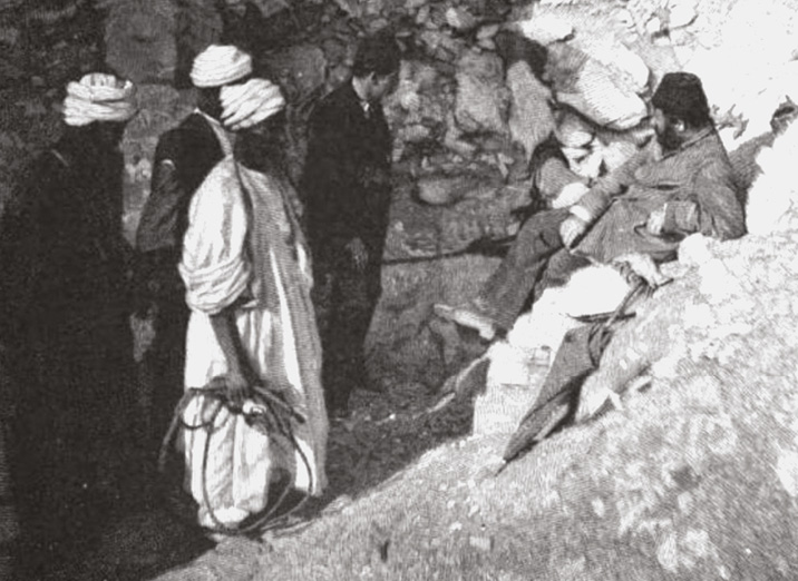 above Brugsch, Maspero, and the Abd el-Rassul brothers at the entrance to the Royal Cache tomb at Deir el-Bahri.