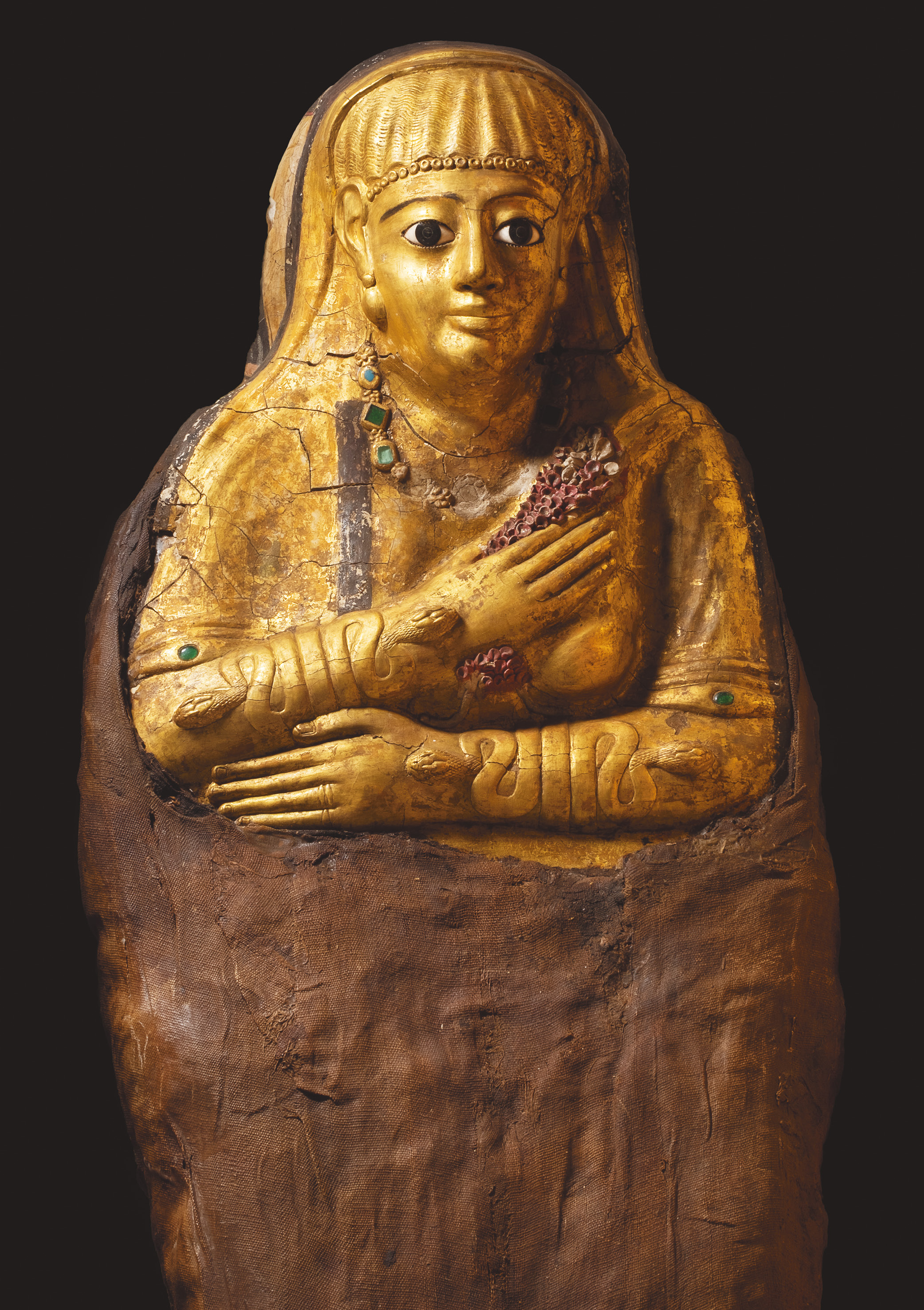 opposite The gilded cartonnage outer decoration of the mummified body of a woman. From Hawara, c.AD 100.