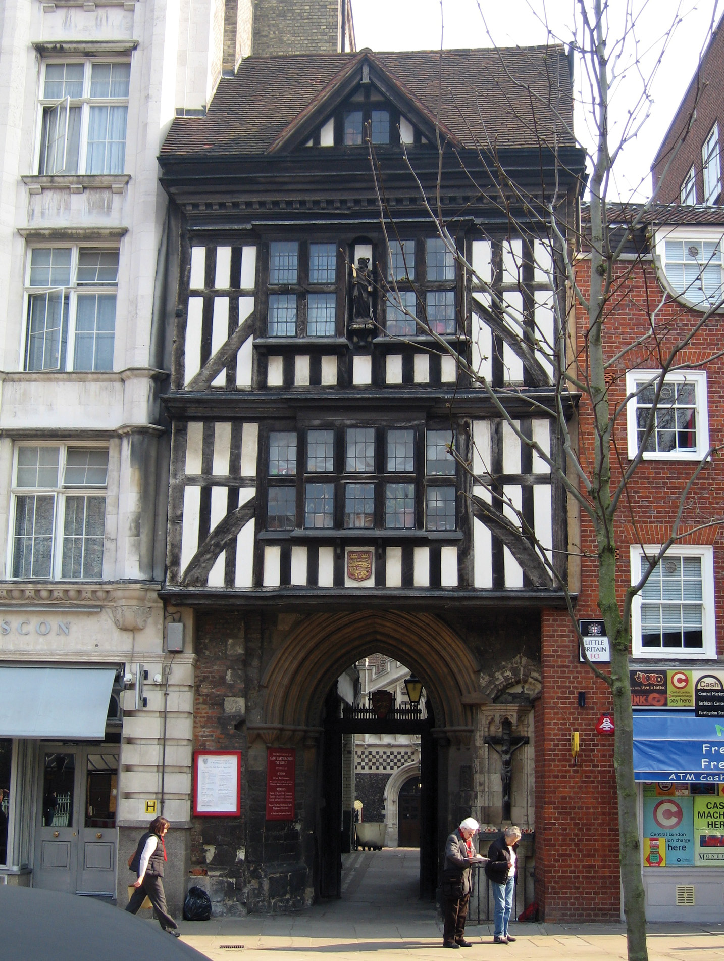 left The gatehouse at St Bartholomew the Great: the conversion of the south- west corner of what had been a church was carried out by the Dominicans c.1556, when they established their short-lived priory at Smithfield during the reign of the Catholic Mary I. Further alterations to the gatehouse were carried out in the late 16th and early 20th centuries.