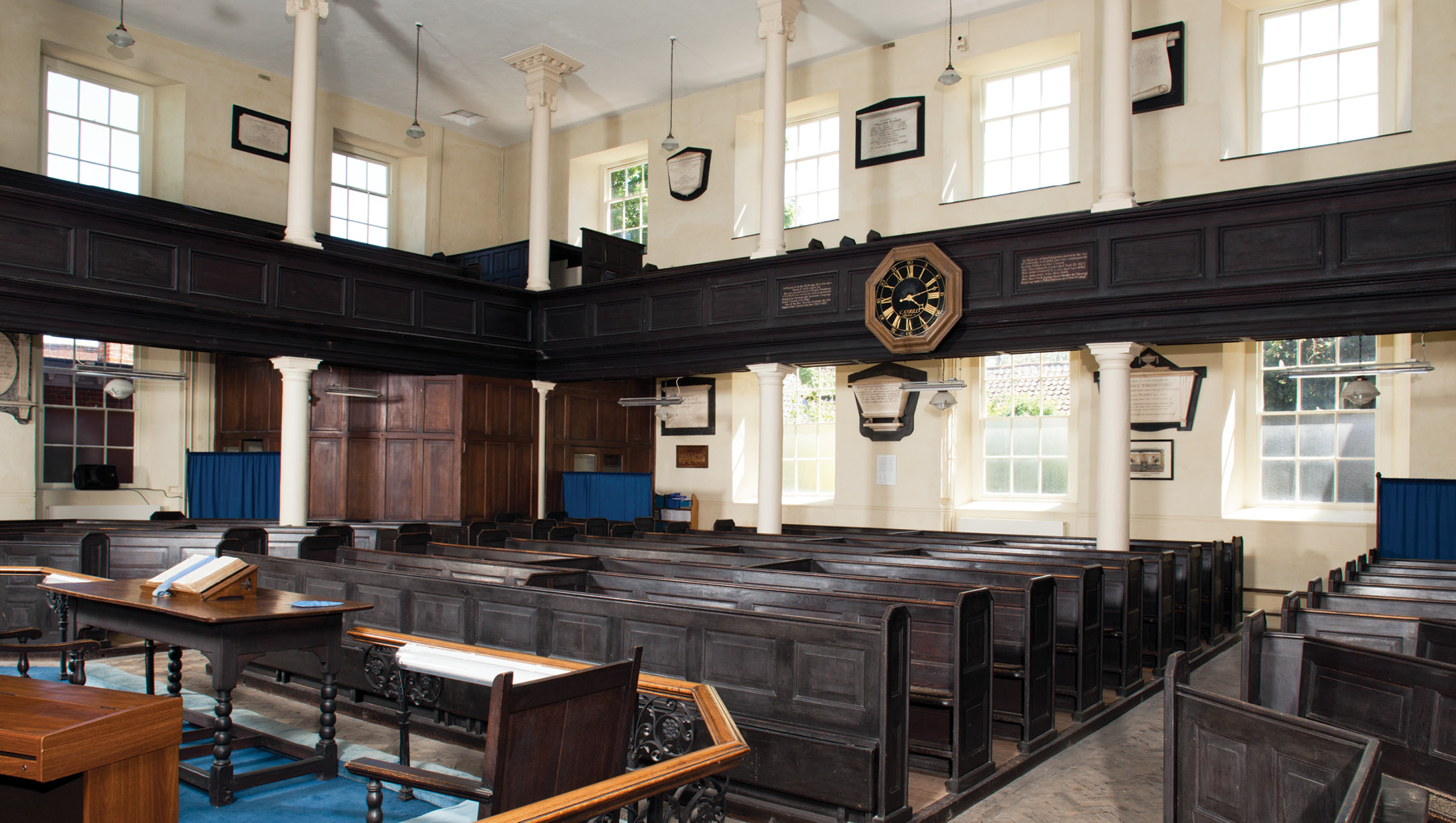 below The interior of the Old Meeting House in Norwich, completed in 1693, shows the influence of Dutch chapel design. The gallery and the Doric and Ionic columns are original. The 19th-century ground-floor pews reflect the layout of the originals in being angled towards the pulpit.