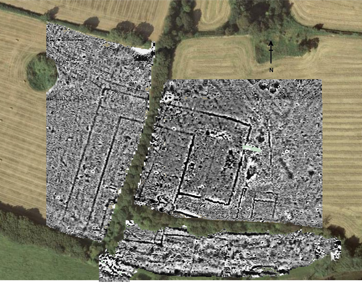 above Prominent in this composite geophysical survey image are the mid- 1st-century enclosure ditches. The villa remains are much more difficult to discern on the right-hand side of the hedge.