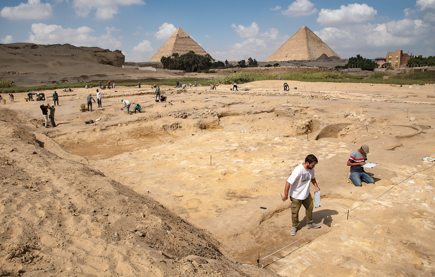 below Excavation in progress in 2022 at the ‘Lost City of the Pyramid Builders’, in Giza, Egypt. Thirty-five years after Ancient Egypt Research Associates initiated fieldwork here, an overview of the huge settlement is still coming together, and with it a much fuller understanding of the building of the pyramids.