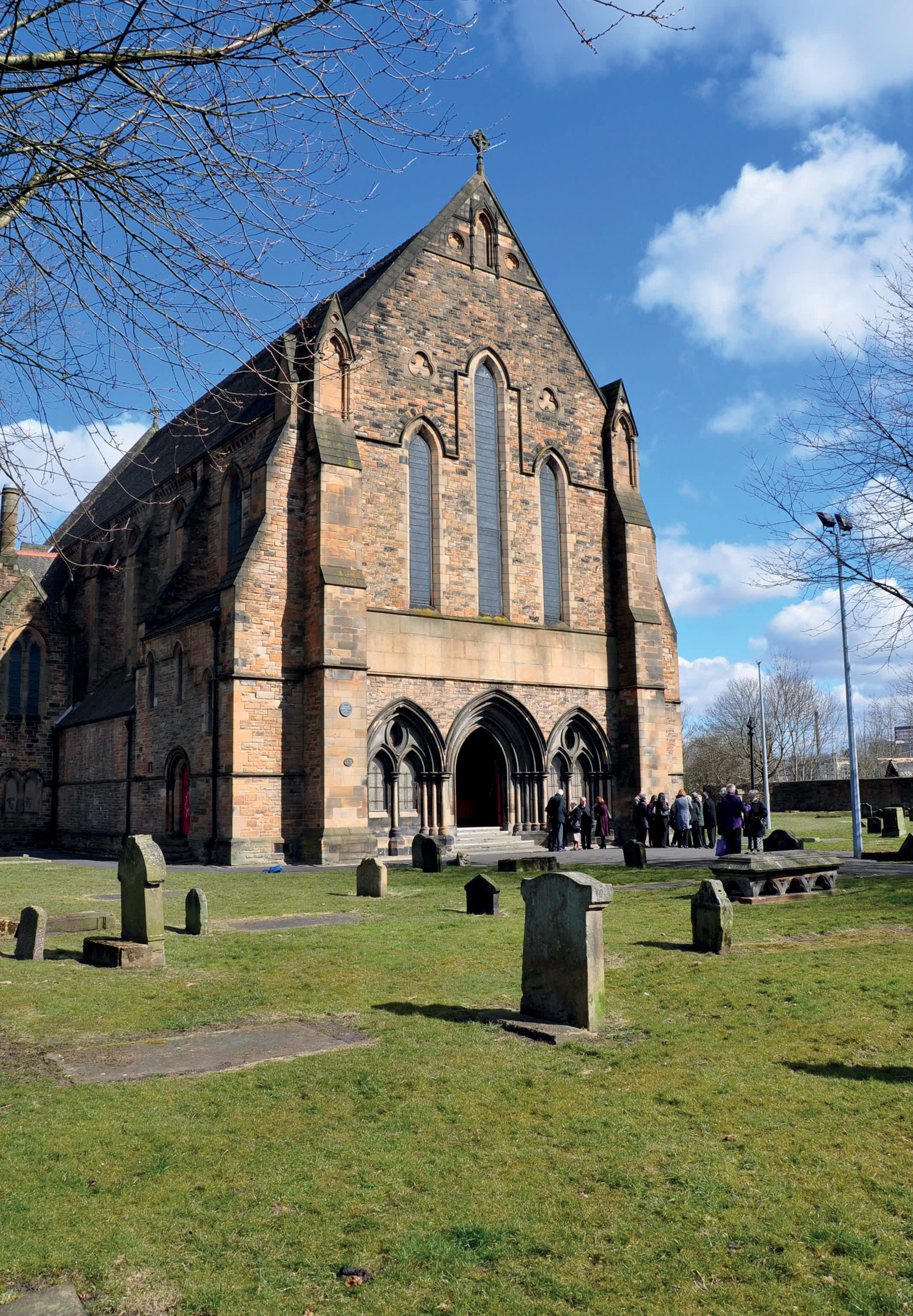 left The entrance façade of Rowand Anderson’s cathedral-sized Gothic Revival masterpiece of 1888, Govan Old Parish Church. This A-listed building is set within an ancient graveyard that looks more sparsely inhabited than it is, as has been demonstrated by recent probing surveys.