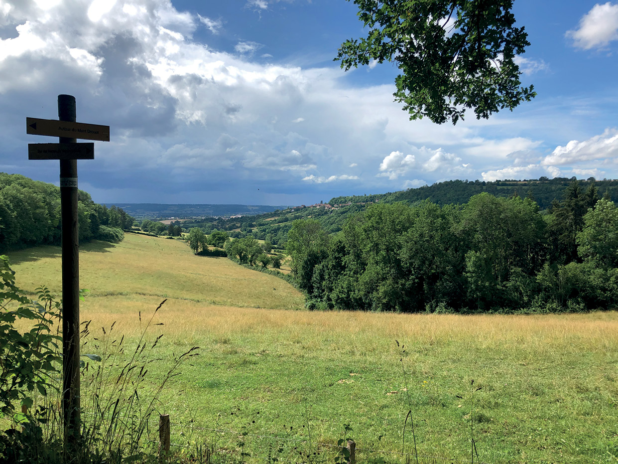 ABOVE LEFT The trail as it approaches Alésia, which lies to the left. LEFT Looking north from within the defences of the former oppidum. ABOVE Along this stretch of the trail, visitors can enjoy various examples of modern art, including this wooden sculpture.