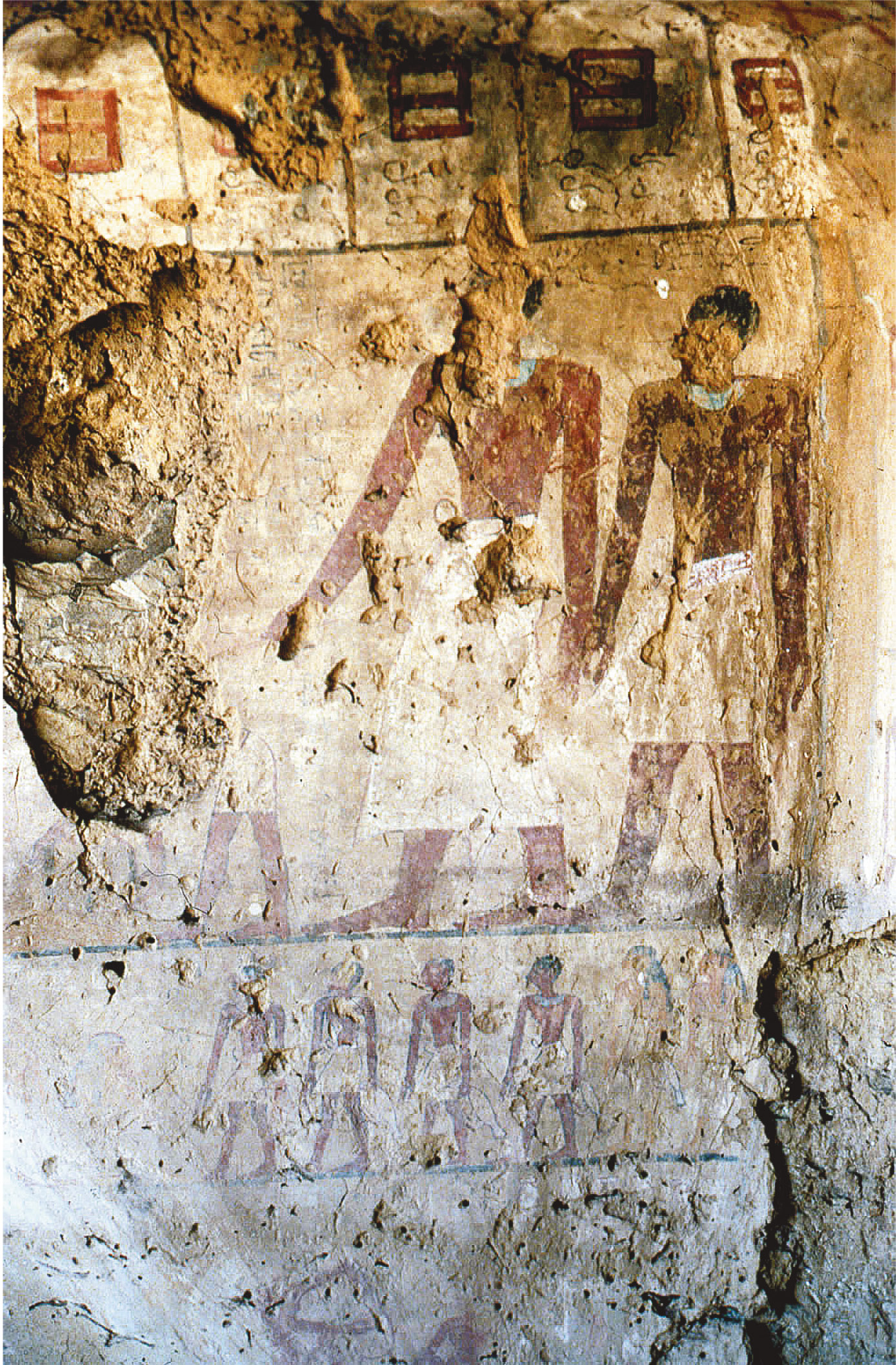 left ‘Overseer of the Fields’ Horemkhauef (on the left), in front of a row of granaries, in a scene from his tomb at Hierakonpolis.
