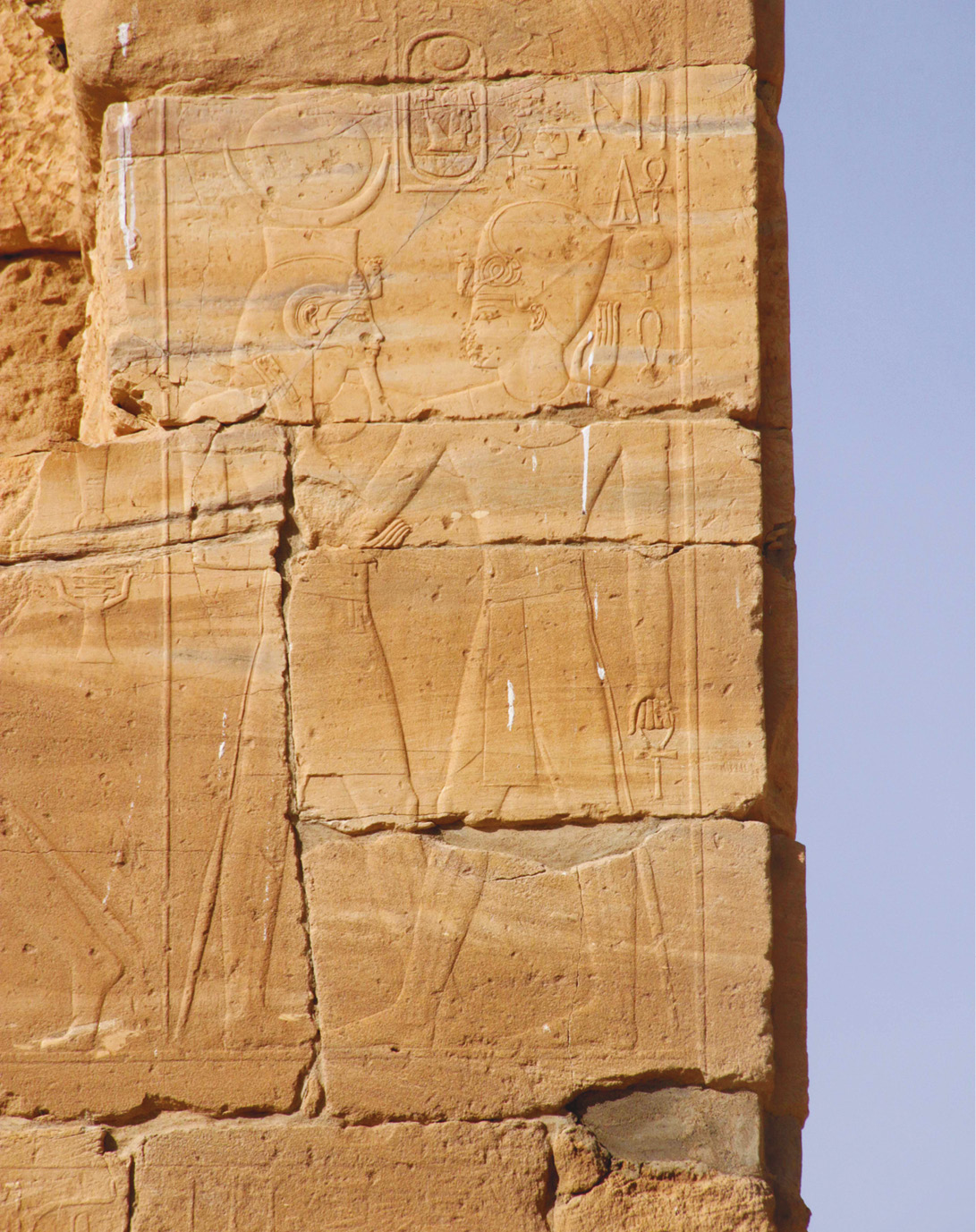 above Amenhotep III the king, with avatar, the deified ‘Nebmaatra Lord of Nubia’, at the Temple of Soleb in Nubia. right Sety I anoints the deified Ramesses I in the guise of Osiris, in a scene from Sety’s cult temple at Qurna in Western Thebes.