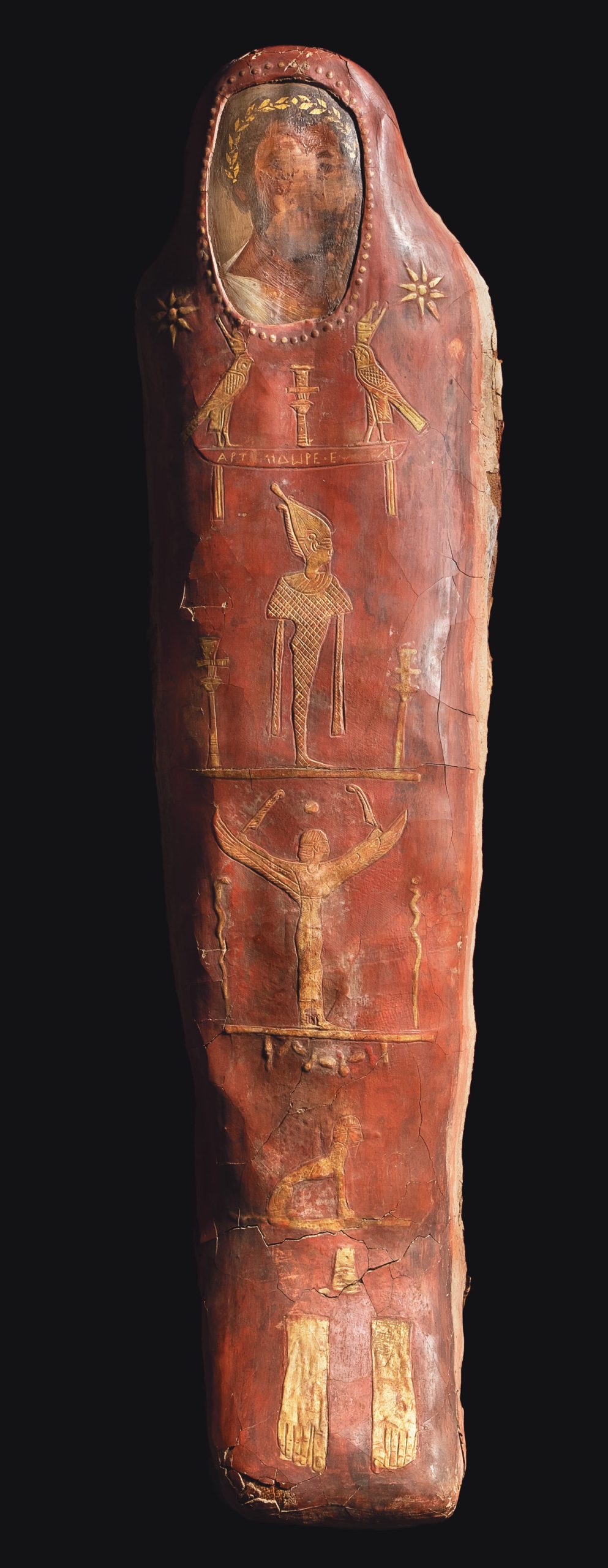 Opposite Mummy of a man named Artemidorus, c.AD 110-160, based on the portrait. From Hawara. Size: 186cm tall RIGHT Mummy of a young girl, 1st century AD. From Hawara. Size: 110cm tall