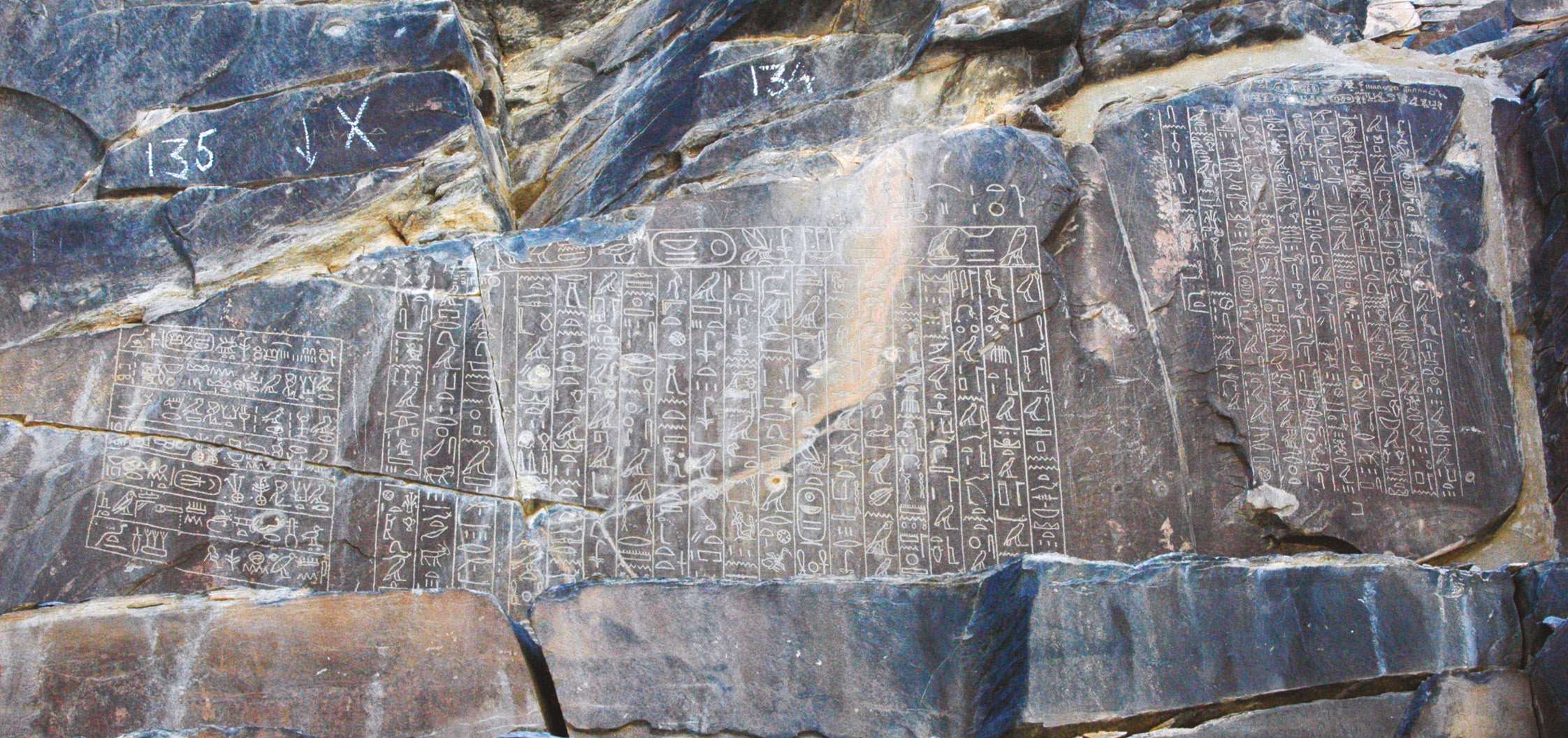 above An inscription at Wadi Hammamat recording an expedition carried out during the reign of the Eleventh Dynasty king Mentuhotep IV, by his vizier Amenemhat. LEFT A stela from Deir el-Medina, depicting the Syrian goddess Qadesh, who became the consort of Min during the Eighteenth Dynasty.
