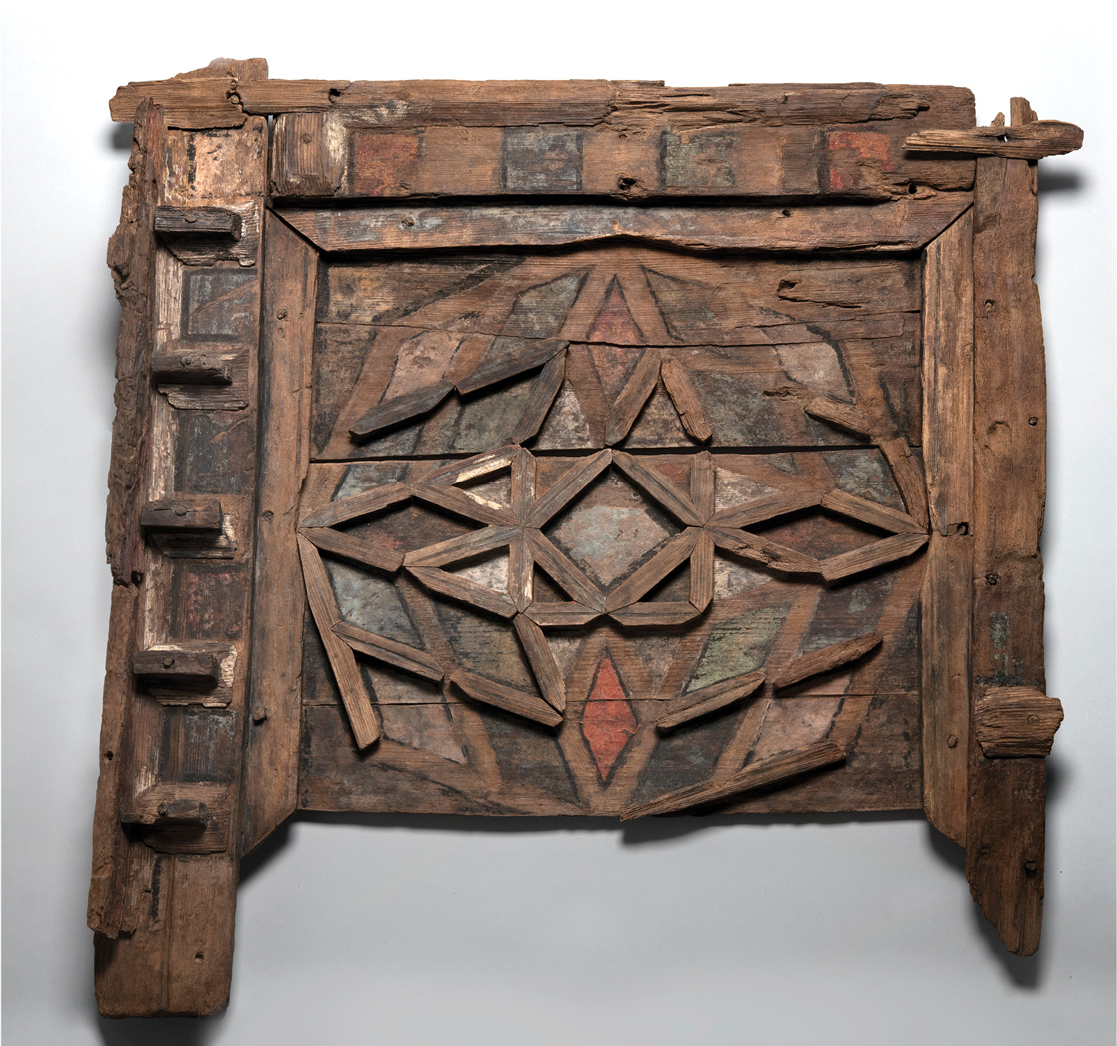 top A painted panel from the coffered ceiling of the House of the Telephus Relief, 1st century AD. Size: 74 x 61cm above Traces of Egyptian blue paint are visible in this fragment of the coffered ceiling of the House of the Telephus Relief, decorated with geometric motifs, 1st century AD. Size: 15 x 76cm