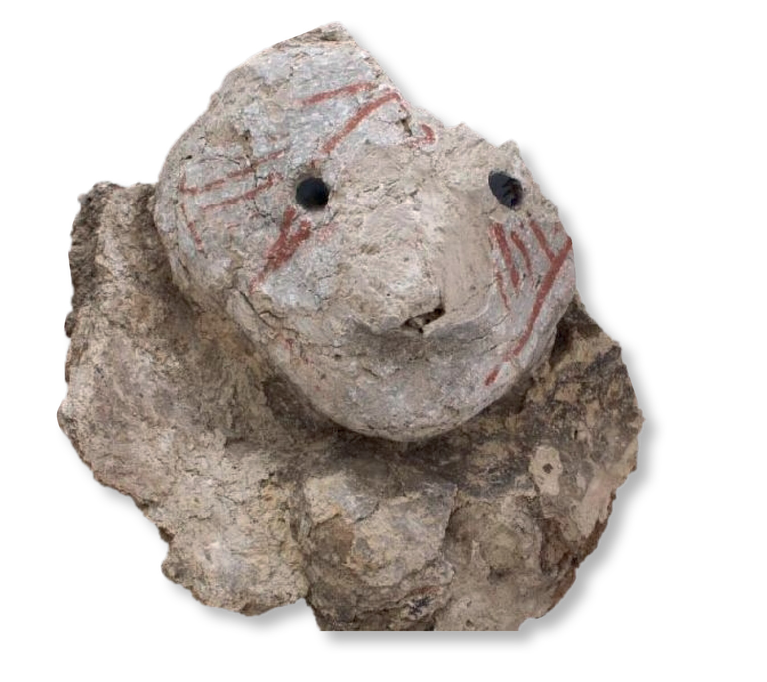 right A plaster head with obsidian eyes from a wall in Building 132, Çatalhöyük.