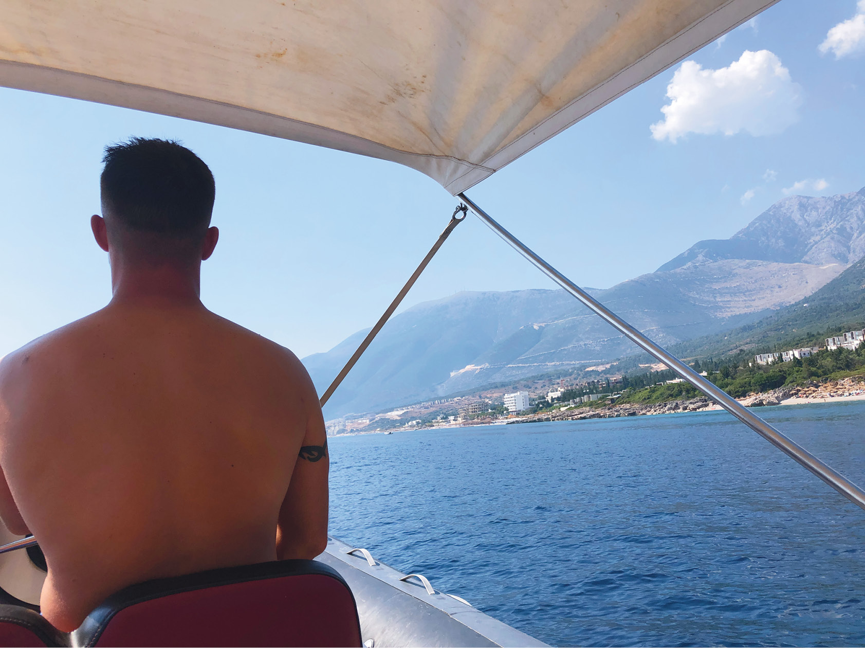 BELOW Romeo, the captain of our zephyr, taking us towards Karaburun.
