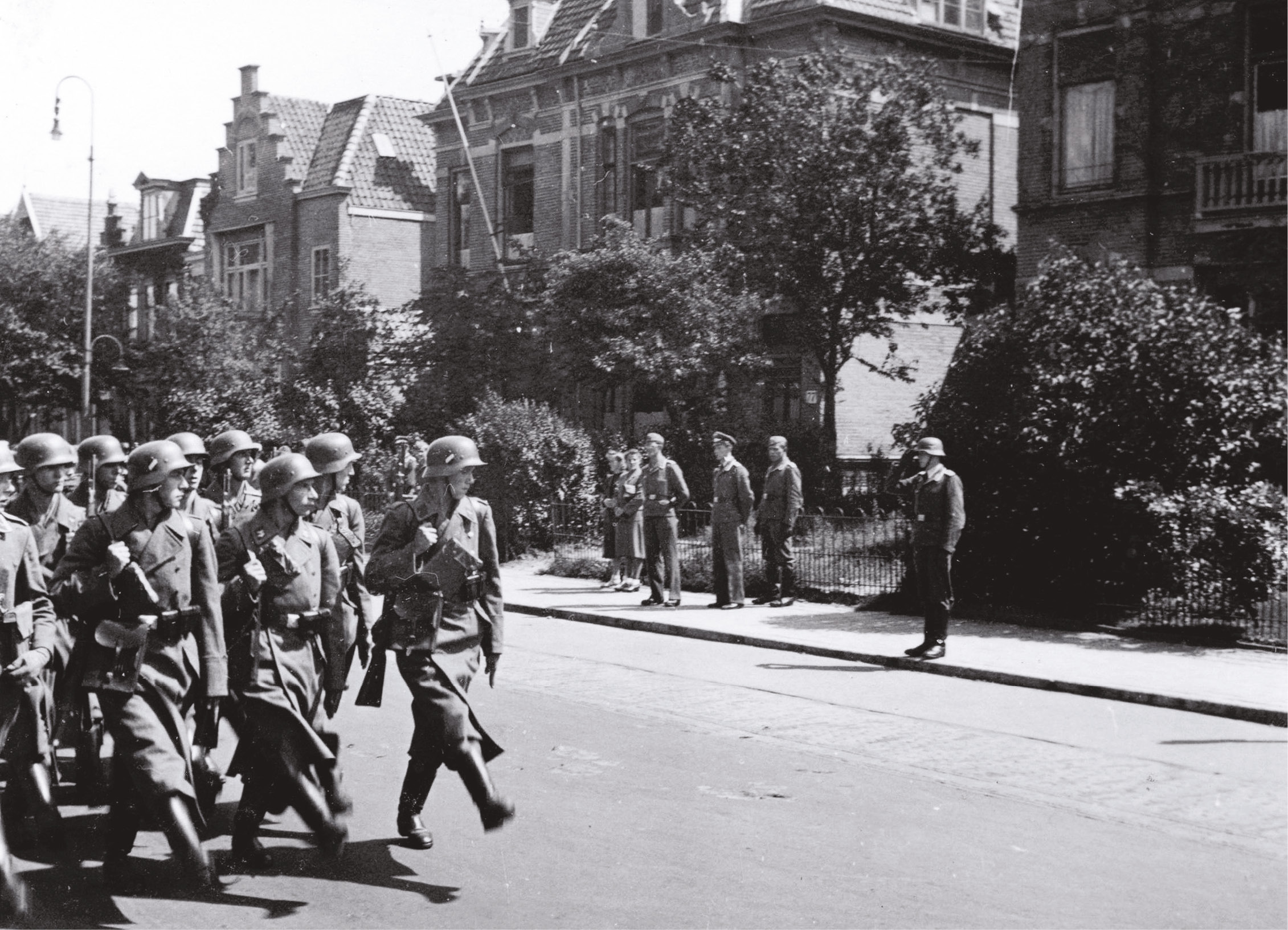 above German troops in the Netherlands, c.1942. The series showed how the military occupation became increasingly tyrannical and racist. below The centre of Stalingrad following the German surrender, 2 February 1943. Thirty years on, Moscow initially refused The World at War team access to Russian interviewees.