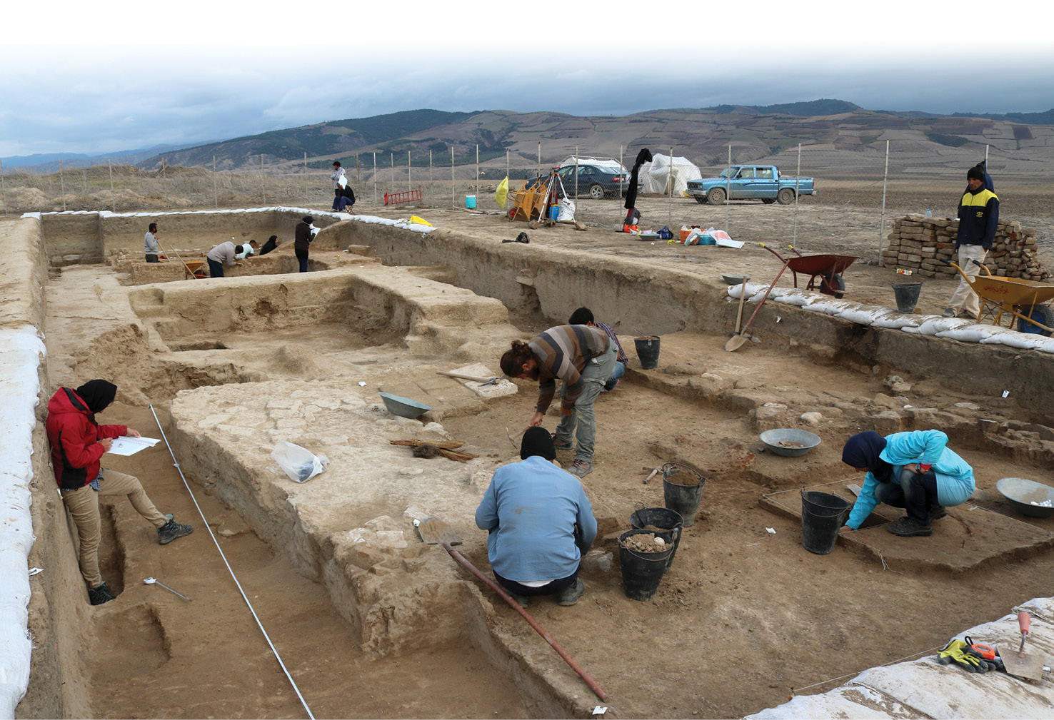 Excavations under way in Fort 2 (left). Our excavations in Fort 2 revealed several distinct phases of occupation from the 5th to the late 6th or 7th centuries. This plan (above) shows features of the (mid?-)6th century, with eight or nine separate ovens operational then in the area of our trench (not counting earlier and later fireplaces); two of the ovens were destroyed when one room was transformed into a storeroom.﻿
